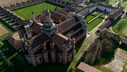 Aerial view of the Certosa di Pavia, built in the late fourteenth century, courts and the cloister of the monastery and shrine in the province of Pavia, Lombardia, Italy