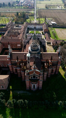 Aerial view of the Certosa di Pavia, built in the late fourteenth century, courts and the cloister of the monastery and shrine in the province of Pavia, Lombardia, Italy