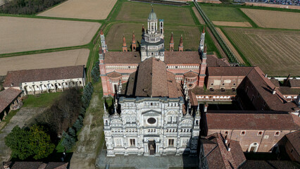 Aerial view of the Certosa di Pavia, built in the late fourteenth century, courts and the cloister of the monastery and shrine in the province of Pavia, Lombardia, Italy