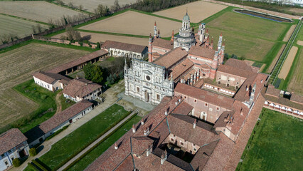 Aerial view of the Certosa di Pavia, built in the late fourteenth century, courts and the cloister of the monastery and shrine in the province of Pavia, Lombardia, Italy