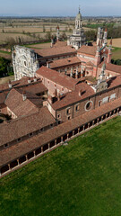 Aerial view of the Certosa di Pavia, built in the late fourteenth century, courts and the cloister of the monastery and shrine in the province of Pavia, Lombardia, Italy