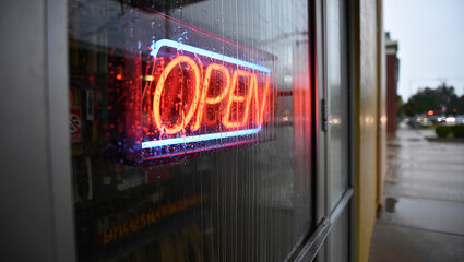 Rainy Day Open Sign: A Neon Sign in the Rain