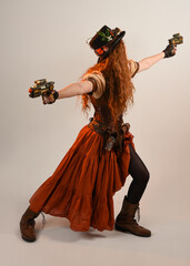 Full length walking portrait Steampunk Botanist, mad scientist, female model in Victorian Costume...