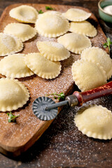 Fresh Homemade Ravioli on Wooden Board