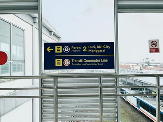 Airport Transit Commuter Line Signage and Train View