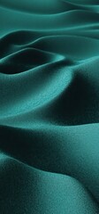 A close-up view of textured fabric, showcasing flowing waves and a rich teal color, creating a sense of depth and elegance.