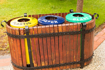 Containers for different types of the garbage outdoor for glass, plastic and paper trash