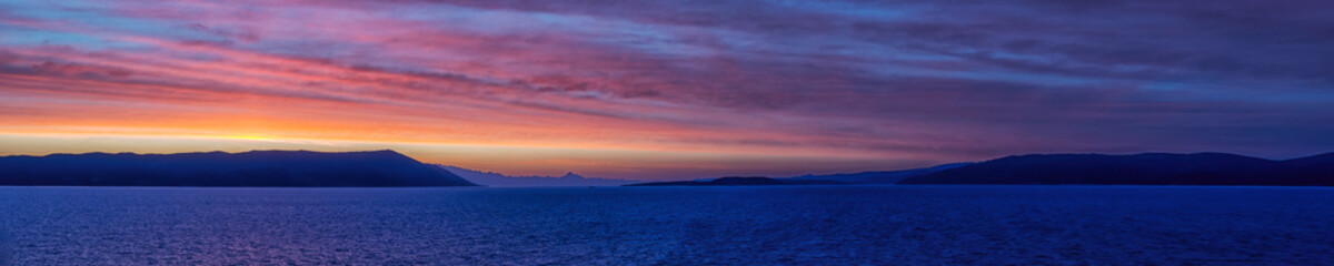 Panorama of coast of Croatia in the Adriatic Sea at sunrise for use as a background