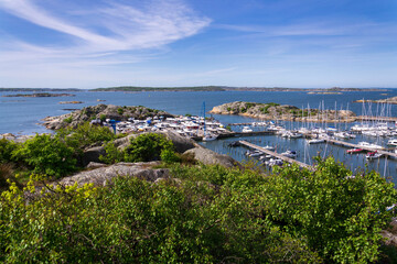 Ships harbour at Saltholmen peninsula on the shore of Alvsborgsfjorden, harbour for archipelago ships, Alvsborg district, Gothenburg, Sweden, sunny day