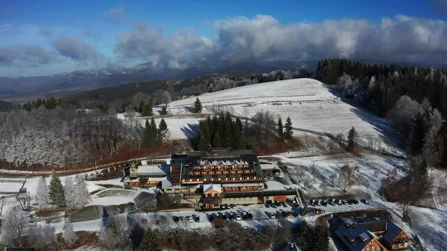 Aerial view of Hotel Havrania nestled in the snow-covered Mala Fatra mountains near Zazriva