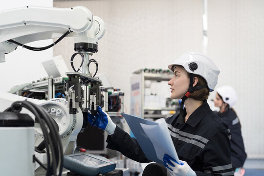 Educational automation robotics. Robotic assembly and invention. Robotics training, setup, installation AI robot and learning. Engineer control, training education robots in workshop