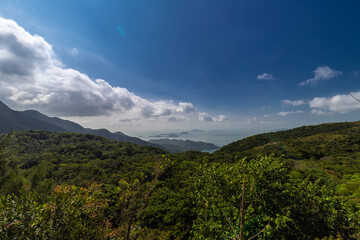 Lantau Island, Hong Kong, 10-20-2024 Views over Lantau Island seen from the cable car which connects downtown Tung Chung and Ngong Ping with the statue of the biggest buddha and the Po Lin Monastery