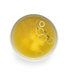 Bowl of tasty vegetable broth on white background