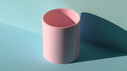 Pink cylinder container on teal background