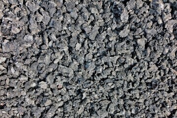 Crushed stone grey wall texture