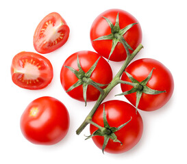 Ripe cherry tomatoes on a branch and pieces on a white background. Top view