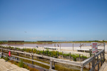 Obraz premium landscape from Lake Atanasovsko Salt located near Burgas in Bulgaria Famous for its pink color, Desalination lake now used for treatments