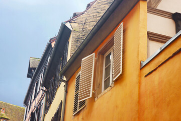 View of buildings with windows and shutters in the center of Strasbourg, France
