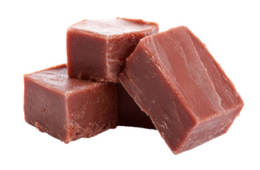 Three square pieces of homemade red fudge are stacked. The background is transparent, making it easy to place on any design or template