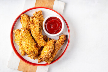 Tasty flavorful freshly cooked chicken nuggets or strips