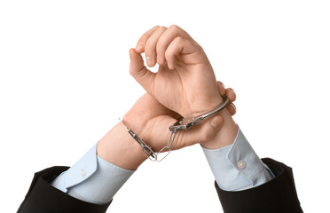 Businessman hands in handcuffs isolated on white background