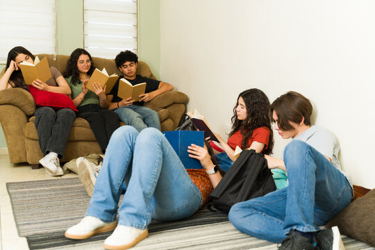 Group of students reading comfortable in school library