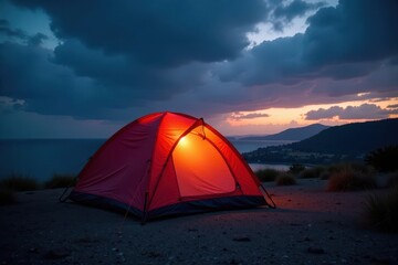 Brightly lit tent stands out against brooding San Juan sky , contrast, forest