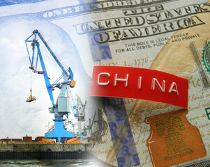 China label on a US hundred dollar bill and a crane at a port