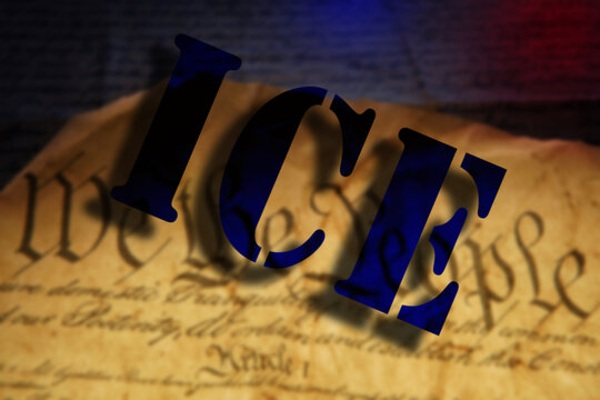 ICE - Immigration and Customs Enforcement - text over We The People text on the US Constitution