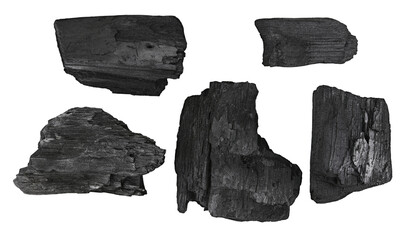 Set natural wood charcoal isolated on a transparent background. Full depth of field. PNG.