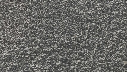 Dark gray gravel stones texture background
