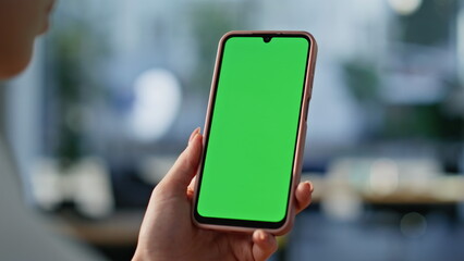 Hands scrolling chromakey mobile phone choosing online purchases at home closeup