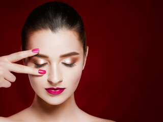 Closing eyes woman face with beautiful makeup 