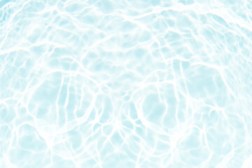 Blue water with ripples on the surface. Defocus blurred transparent blue colored clear calm water surface texture with splashes and bubbles. Water waves with shining pattern texture background.