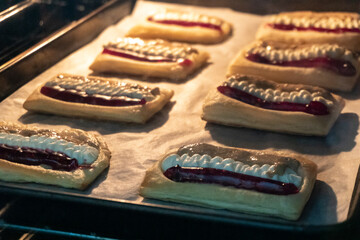 Puff pastry tarts with cream cheese, cherry jam, peanut butter. Dessert. pastry