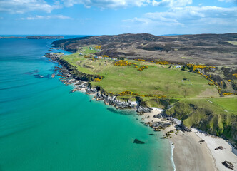 aerial view of bay with golden sand beach at the scottish atlantic coast near Coldbackie in Northern Scotland, UK