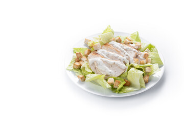 Crunchy Caesar salad with chicken isolated on white background. Copy space