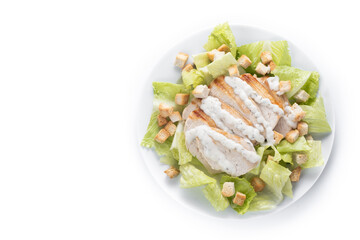 Crunchy Caesar salad with chicken isolated on white background. Top view. Copy space