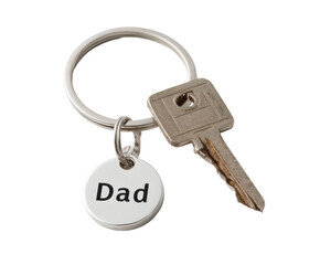 A silver keyring with a key and a charm that says 'Dad', perfect for a gift.