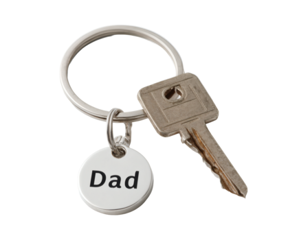 A silver keyring with a key and a charm that says 'Dad', perfect for a gift.