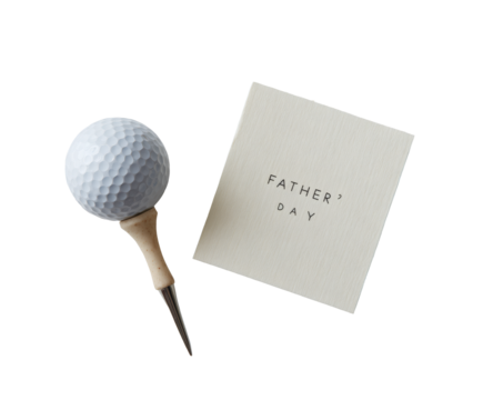 A golf ball on a tee with a Father's Day card, perfect for a thoughtful gift. - Powered by Adobe