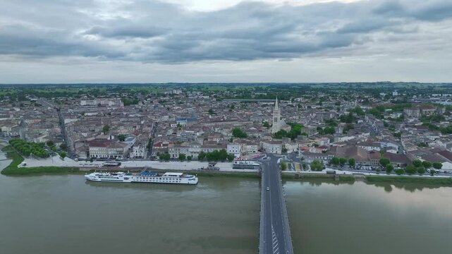 Twilight over Libourne from a drone, Gironde, Nouvelle-Aquitaine, Saint-&Eacute;milion and Pomerol, Southwestern France, Europe