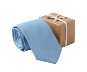 A light blue tie rests beside a wrapped gift box with a white ribbon.