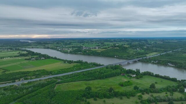 Sunset Bridge and river in Libourne from a drone, Gironde, Nouvelle-Aquitaine, Saint-&Eacute;milion and Pomerol, Southwestern France, Europe