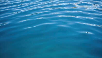 Naklejka premium Blue water ripple background. 7