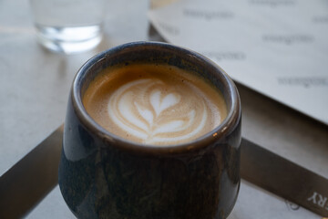 Close-Up of Heart-Shaped Latte Art in Ceramic Coffee Cup