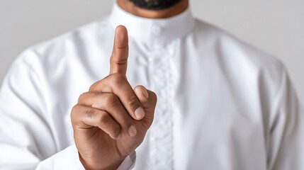 Close Up of a Muslim Finger Pointing Up : Suitable for Be Used in Blog Posts, Social Media Posts or Website Content Related to People, Culture and Religion Theme.