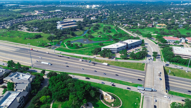 Residential houses, golf course, commercial buildings in master development area in Las Colinas, Irving, office space for rent, corporate campus along John Carpenter Freeway, Texas SH 121, aerial