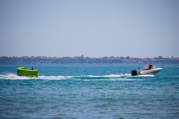 landscape with pleasure boats on a blue sea, travel concept