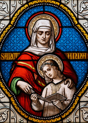 Assumption church.  Stained glass. The education of Mary by her mother St Anne.  Lessard en Bresse. France.